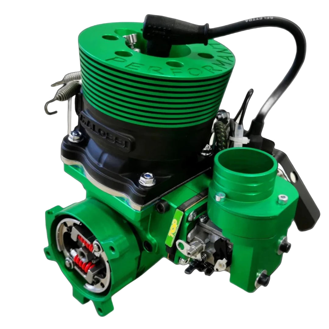 Green engine block with various components on a white background
