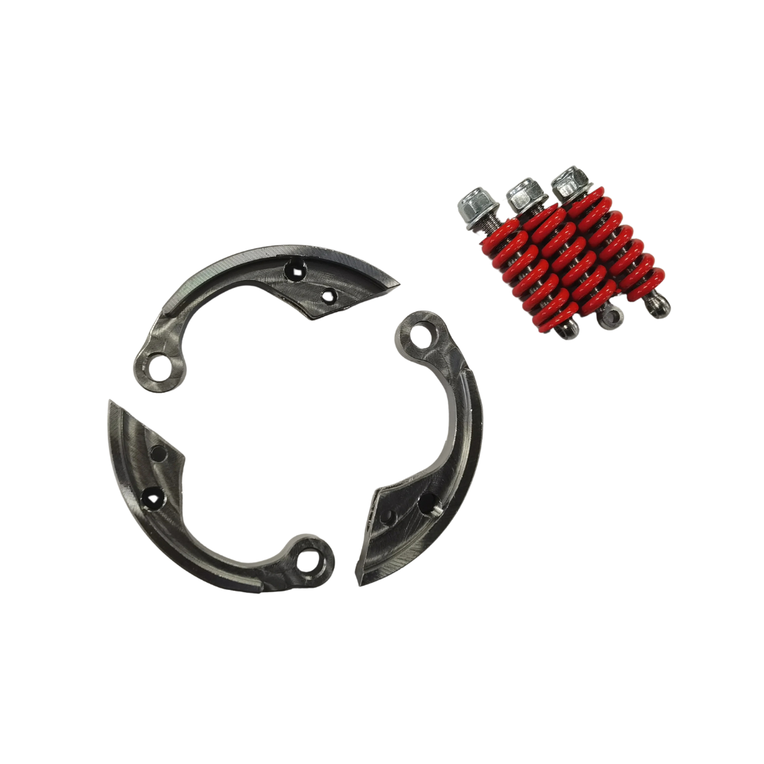 Mechanical components including a spring and metal plates on a white background