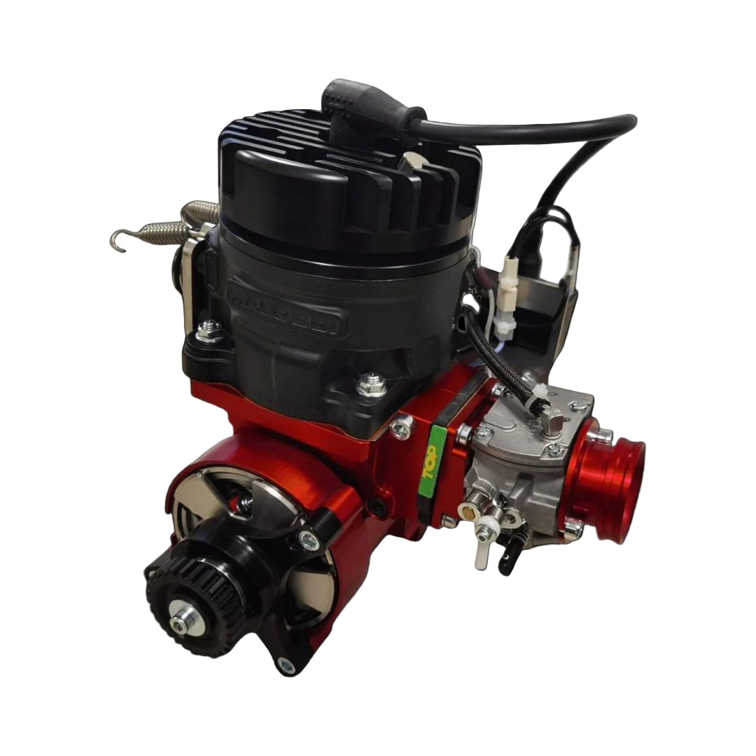 Engine block with red and black components on a black background