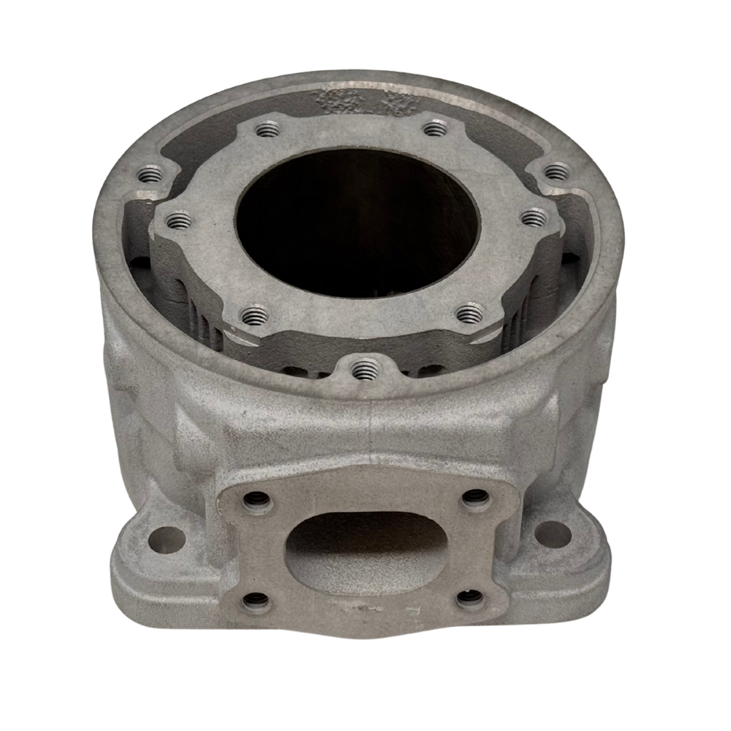 Metal engine cylinder block on a white background