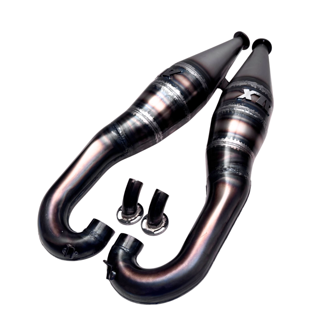 Pair of metallic exhaust pipes on a white background